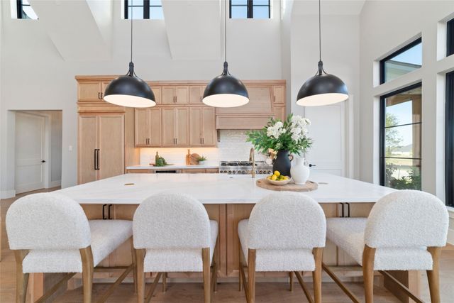 a view of a dining room with furniture and window