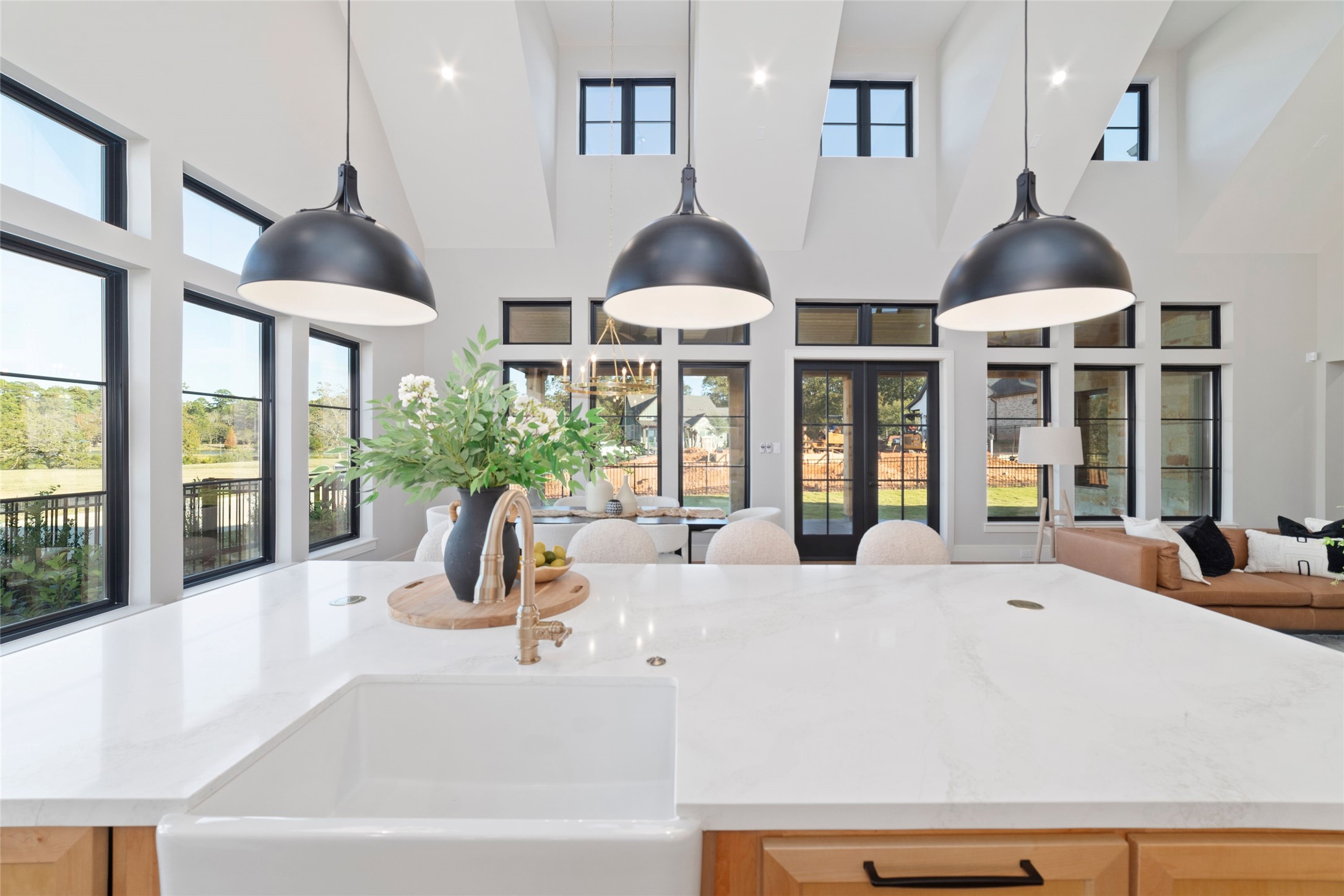 14130 Ripple Ridge Drive Willis, TX 77318 - Photo 22 of 38 a chandelier sitting in a living room next to a lamp