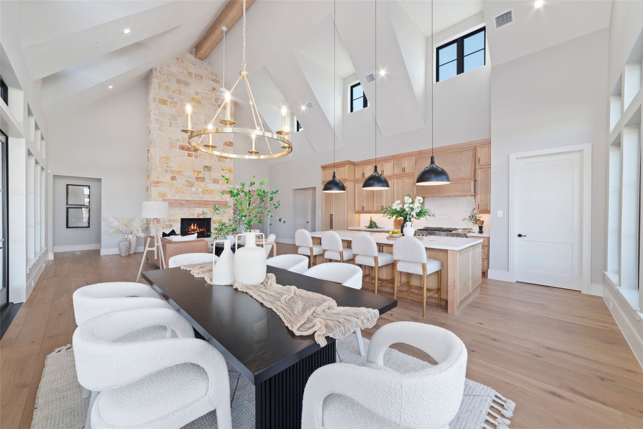 14130 Ripple Ridge Drive Willis, TX 77318 - Photo 24 of 38 a living room with lots of furniture kitchen view and a chandelier