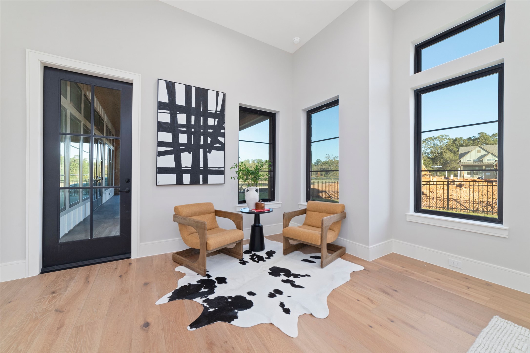 14130 Ripple Ridge Drive Willis, TX 77318 - Photo 27 of 38 a living room filled with furniture and a potted plant