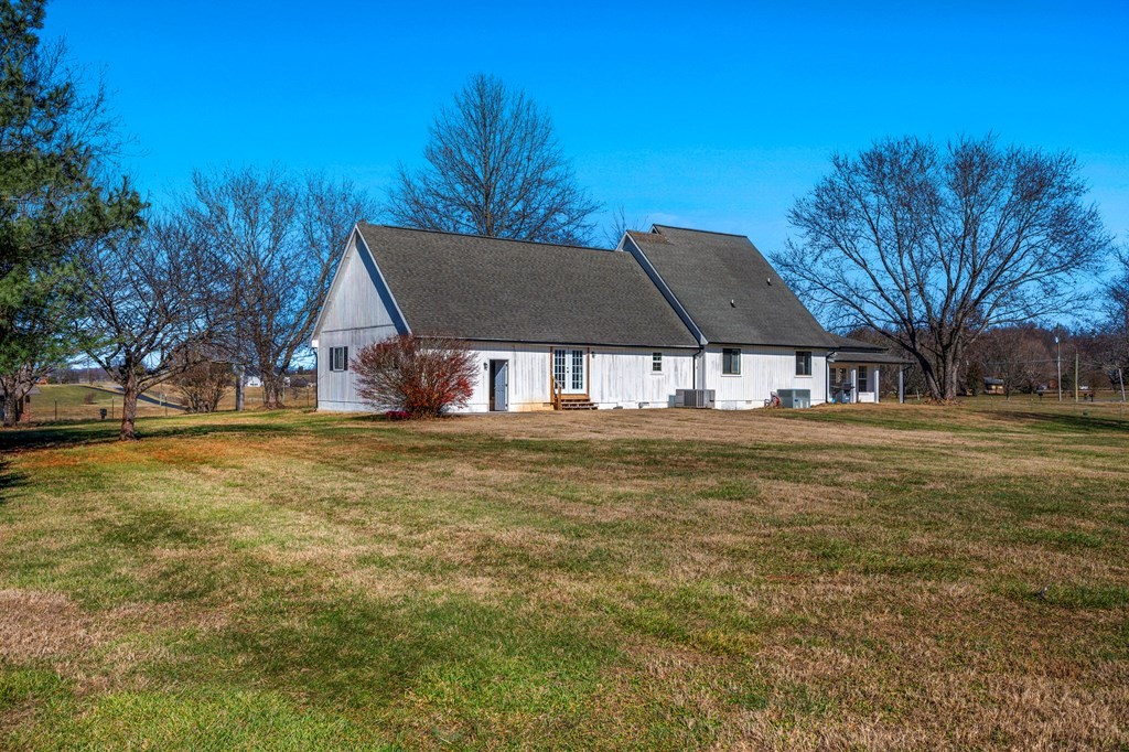 2040 Maples Branch Road Sevierville, TN 37876 - Photo 2 of 40 a house that has a big yard