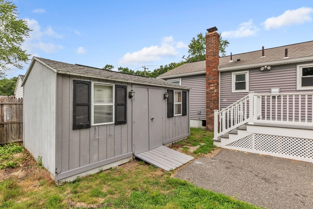 139 Prouty Street Springfield, MA 01119 - Photo 13 of 14 a front view of a house with a yard