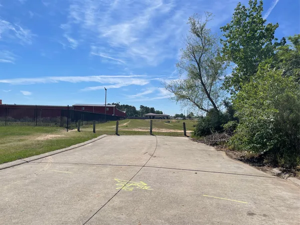 a house with trees in the background