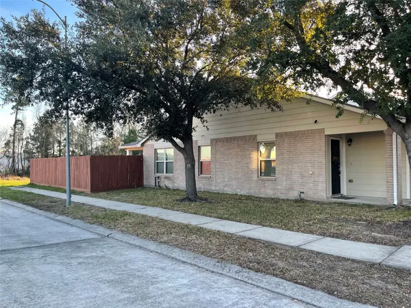 a house with trees in front of it