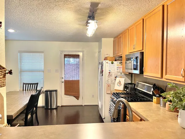 a view of a living room and dining room