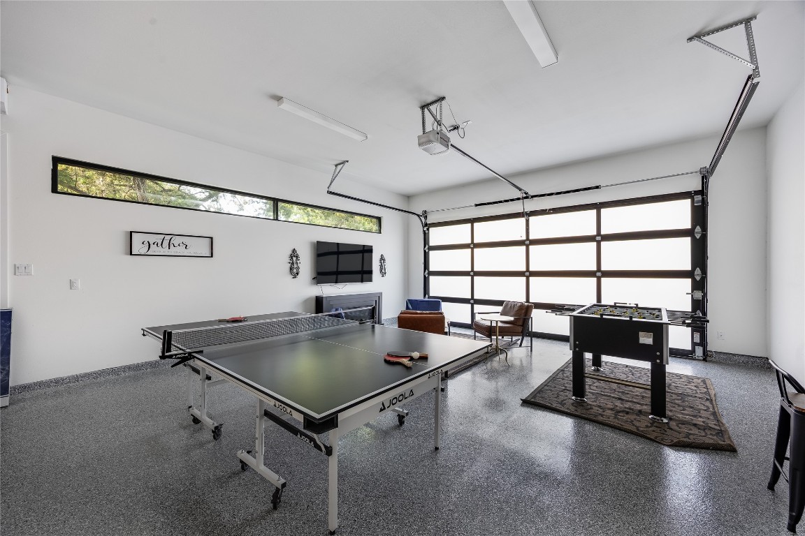 3138 Chisholm Trail Austin, TX 78734 - Photo 23 of 40 a living room with pool table and windows