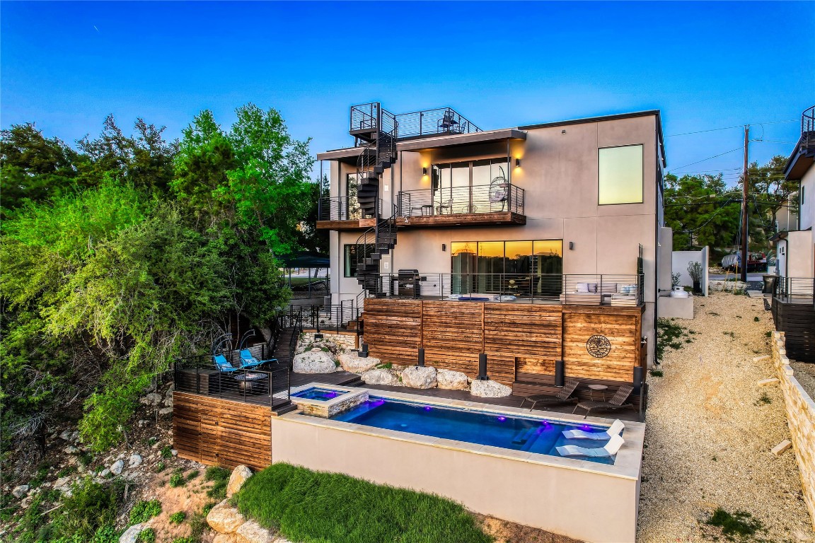 3138 Chisholm Trail Austin, TX 78734 - Photo 33 of 40 a front view of a house with street view