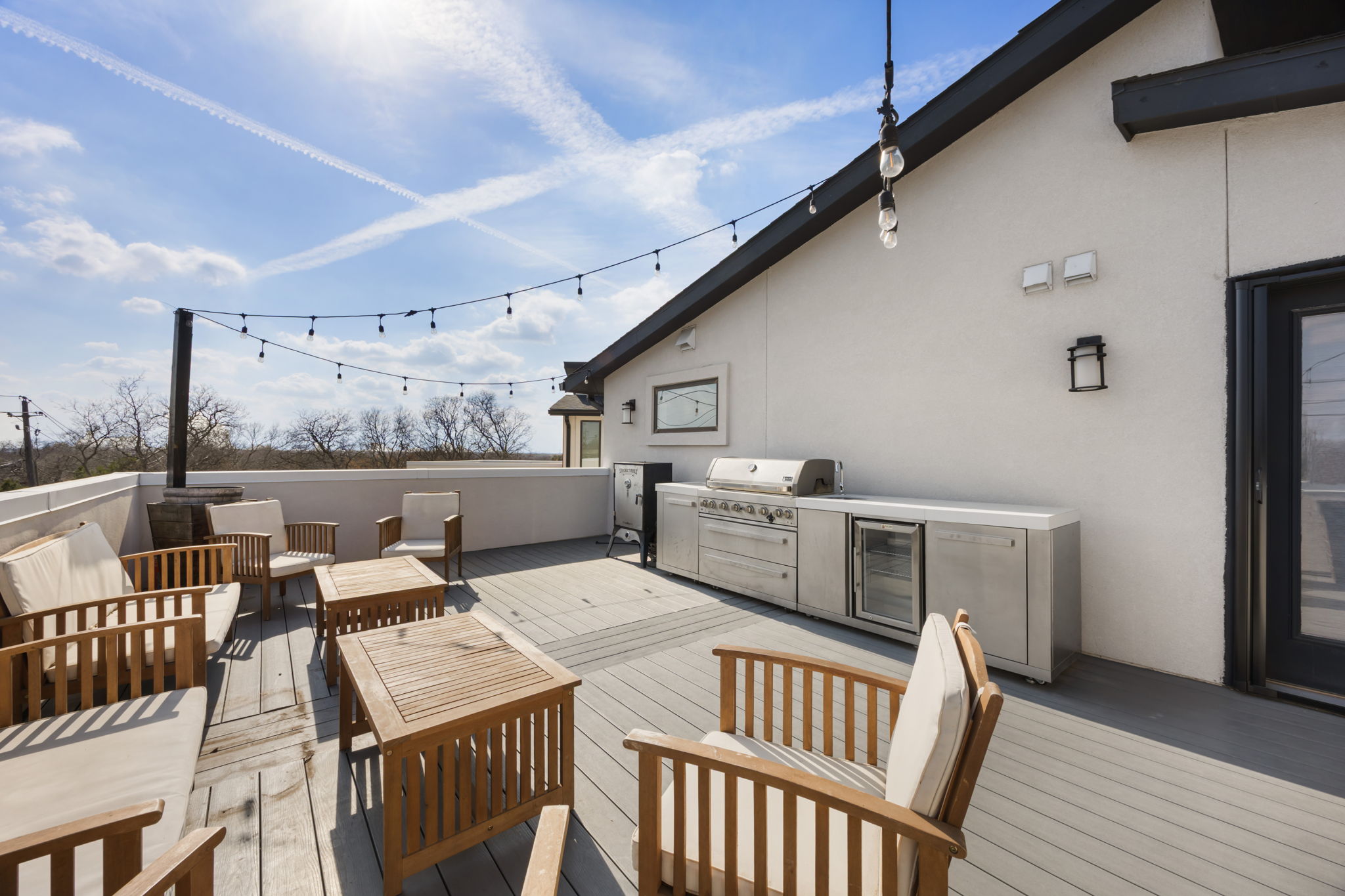 1417 Kramer Lane, Unit 14 Austin, TX 78758 - Photo 23 of 33 Deck featuring an outdoor kitchen and area to lounge