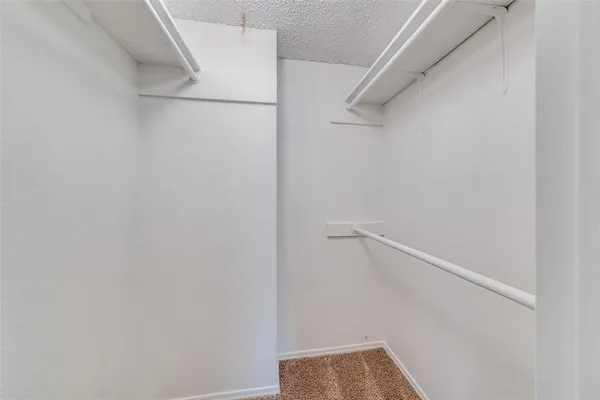 a view of small space with racks on the wall