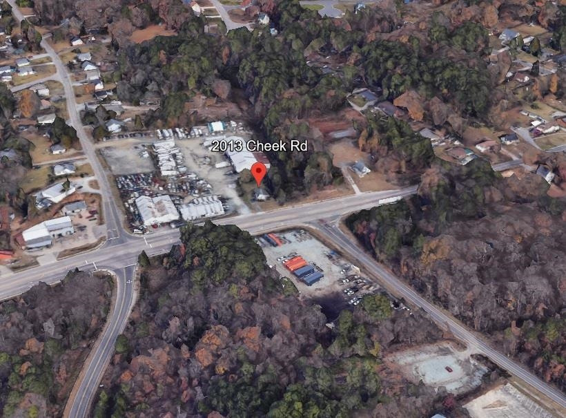 2013 Cheek Road Durham, NC 27704 - Photo 3 of 4 a view of the back yard of the house