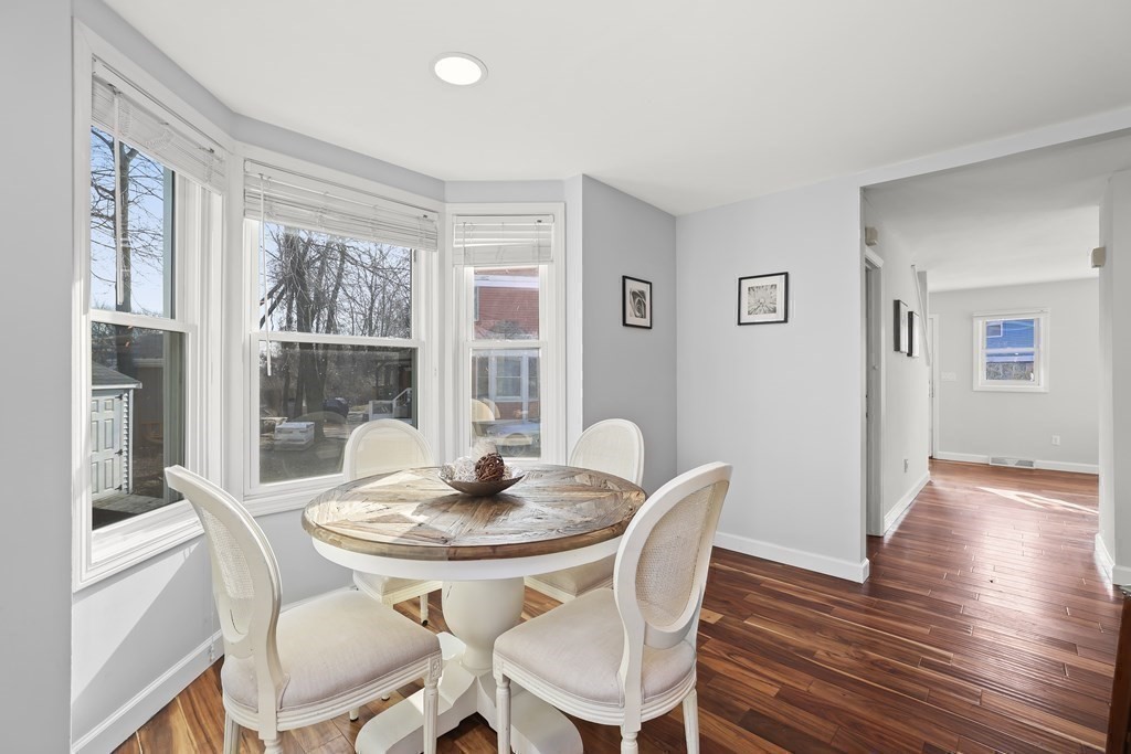 4 Rowe Court, Unit 4 Boston, MA 02131 - Photo 11 of 41 a view of a dining room with furniture window and wooden floor