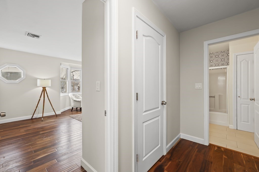 4 Rowe Court, Unit 4 Boston, MA 02131 - Photo 17 of 41 a view of empty room with wooden floor