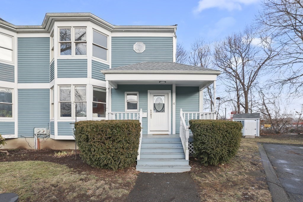 4 Rowe Court, Unit 4 Boston, MA 02131 - Photo 32 of 41 a front view of a house with garden