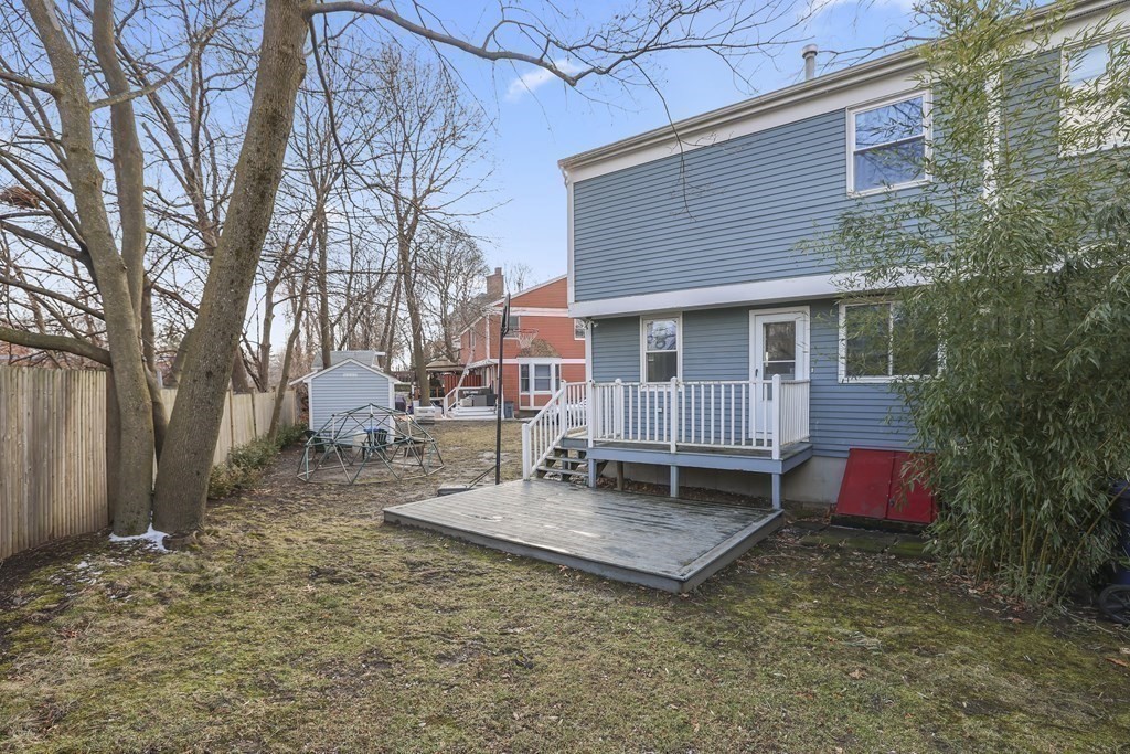 4 Rowe Court, Unit 4 Boston, MA 02131 - Photo 33 of 41 a backyard of a house with seating space