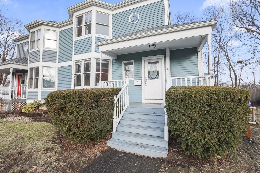 4 Rowe Court, Unit 4 Boston, MA 02131 - Photo 37 of 41 a view of a house with a yard