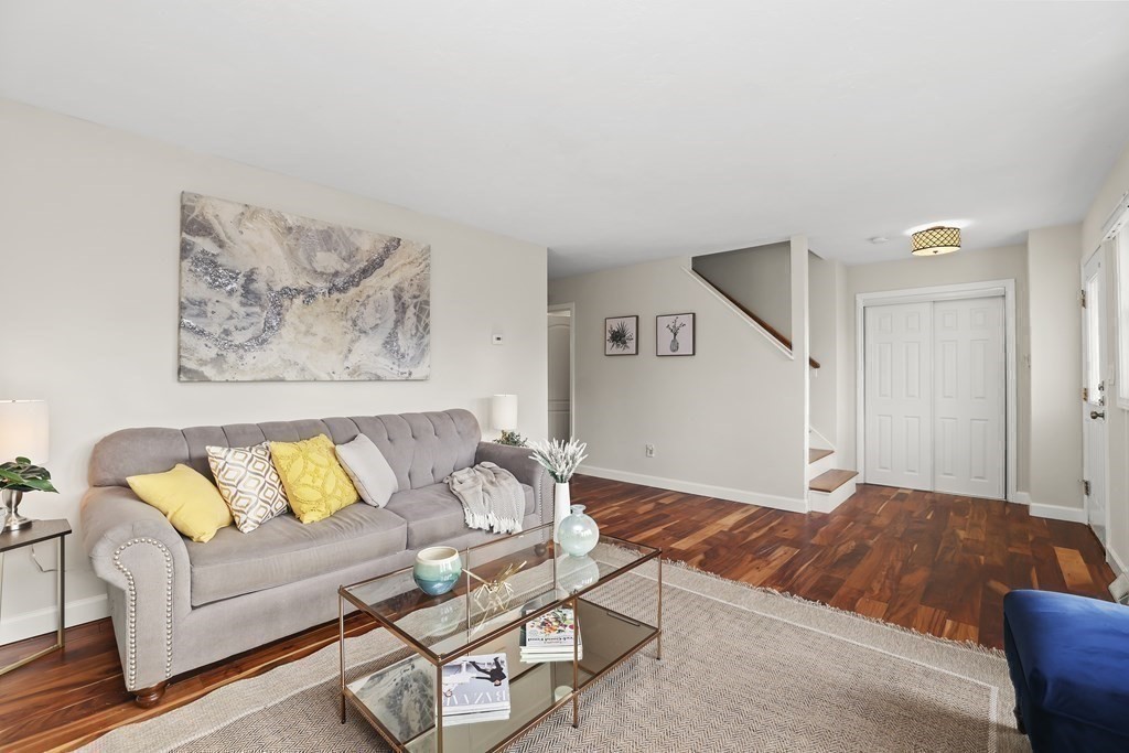 4 Rowe Court, Unit 4 Boston, MA 02131 - Photo 5 of 41 a living room with furniture and a couch