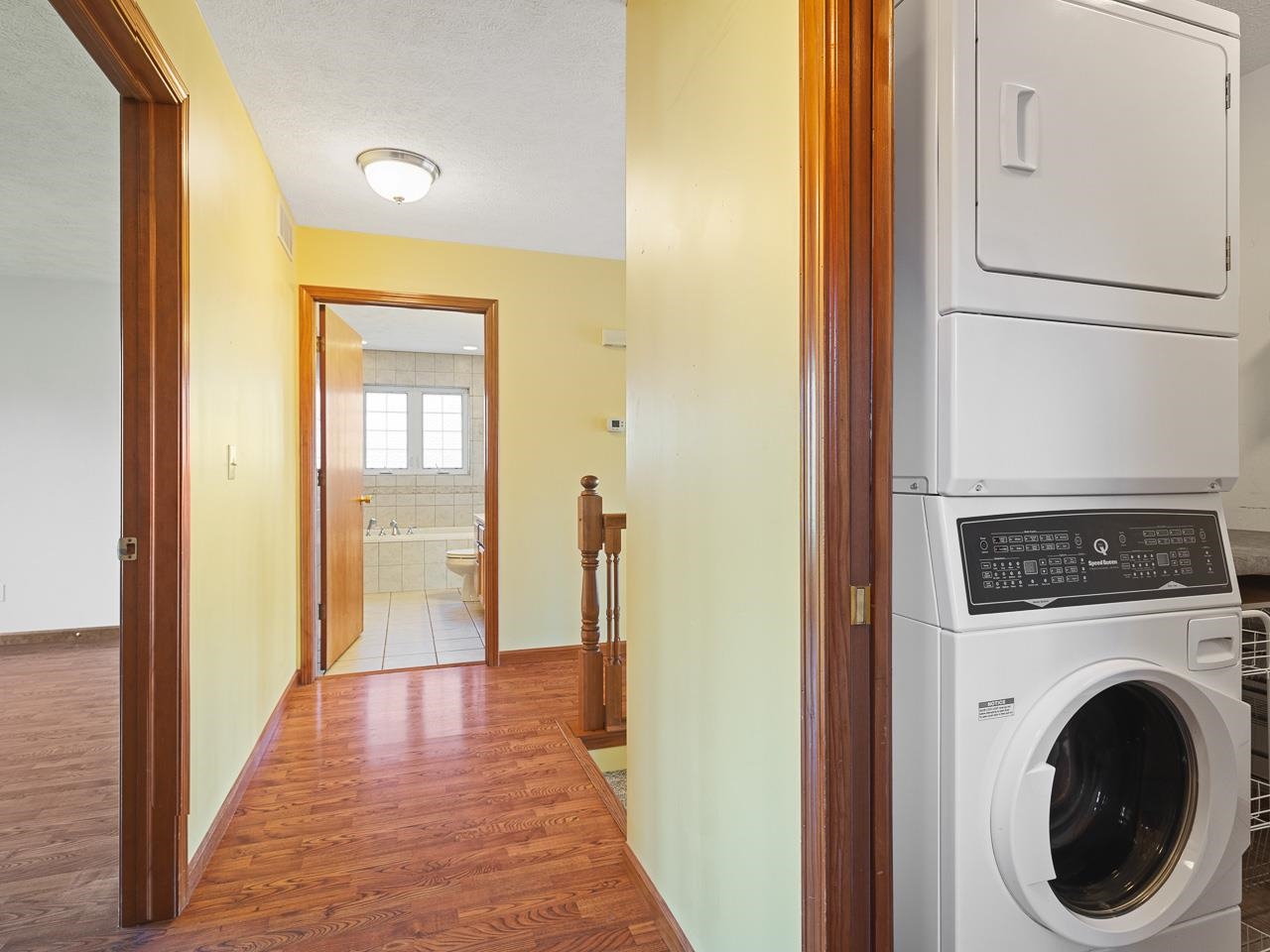 728 Westmore Road Davis, IL 61019 - Photo 3 of 45 a view of a hallway with washer and dryer