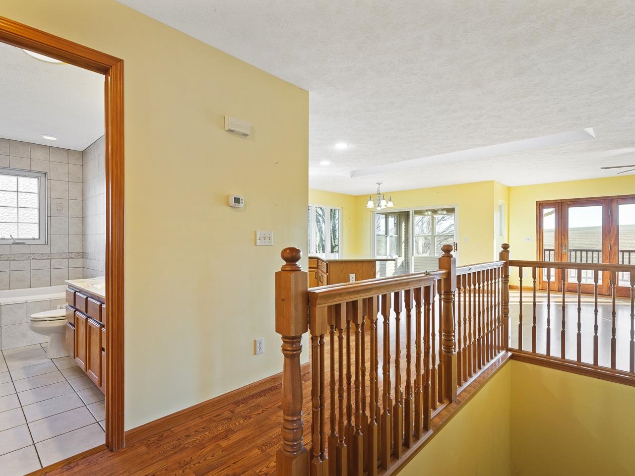 728 Westmore Road Davis, IL 61019 - Photo 5 of 45 a view of a hallway with wooden floor and staircase