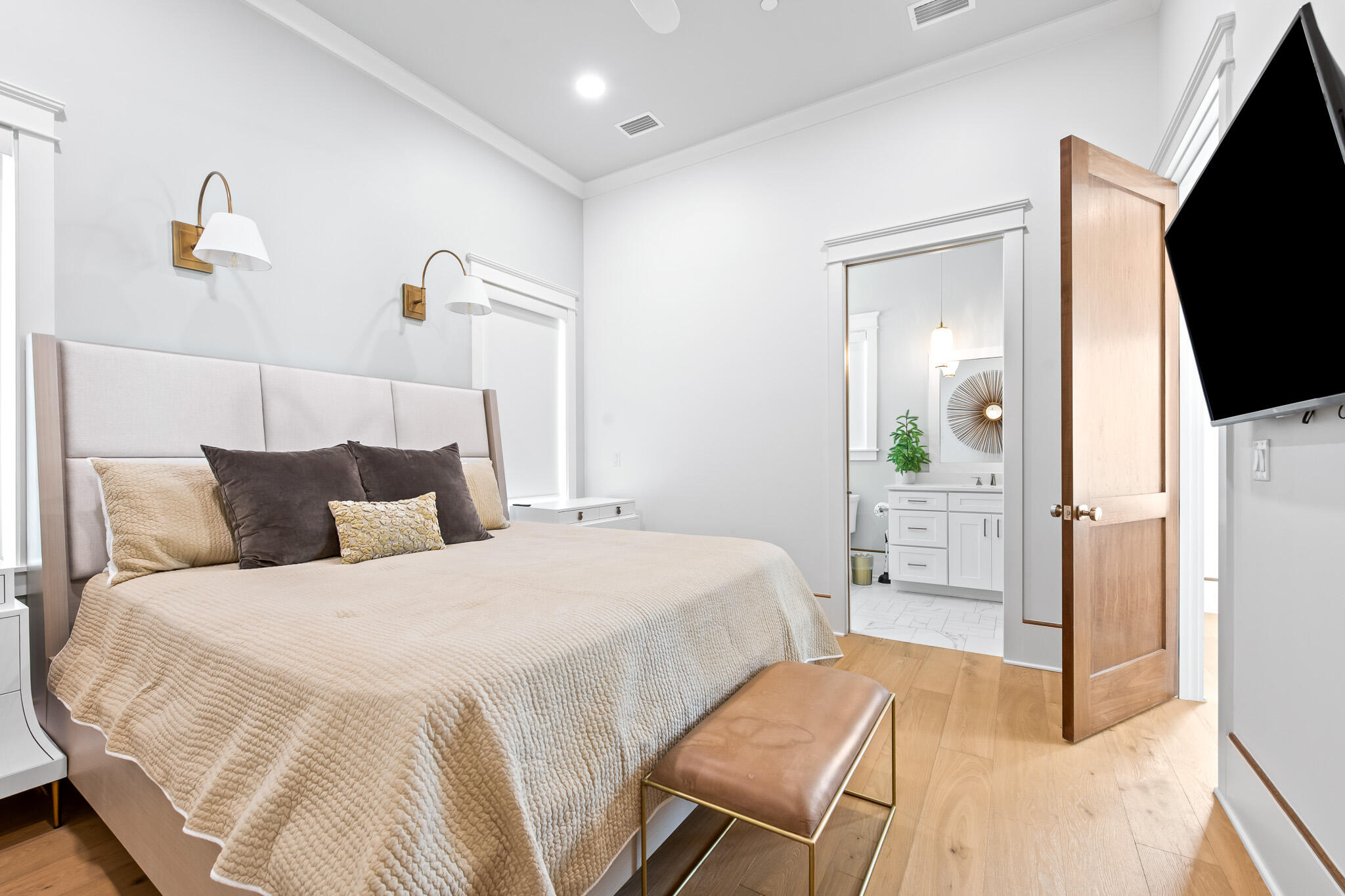 17 Palm Ct Lane Inlet Beach, FL 32461 - Photo 11 of 31 a bedroom with a bed and a flat screen tv