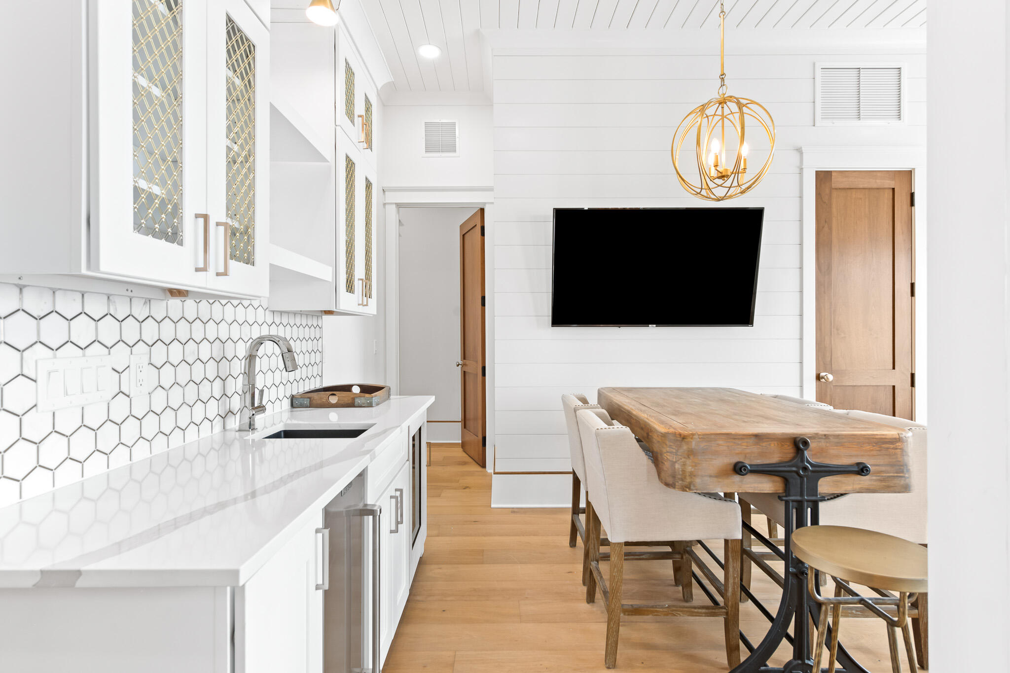 17 Palm Ct Lane Inlet Beach, FL 32461 - Photo 13 of 31 a view of a kitchen area with furniture and wooden floor