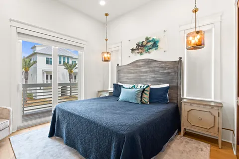 a bedroom with a bed and a table