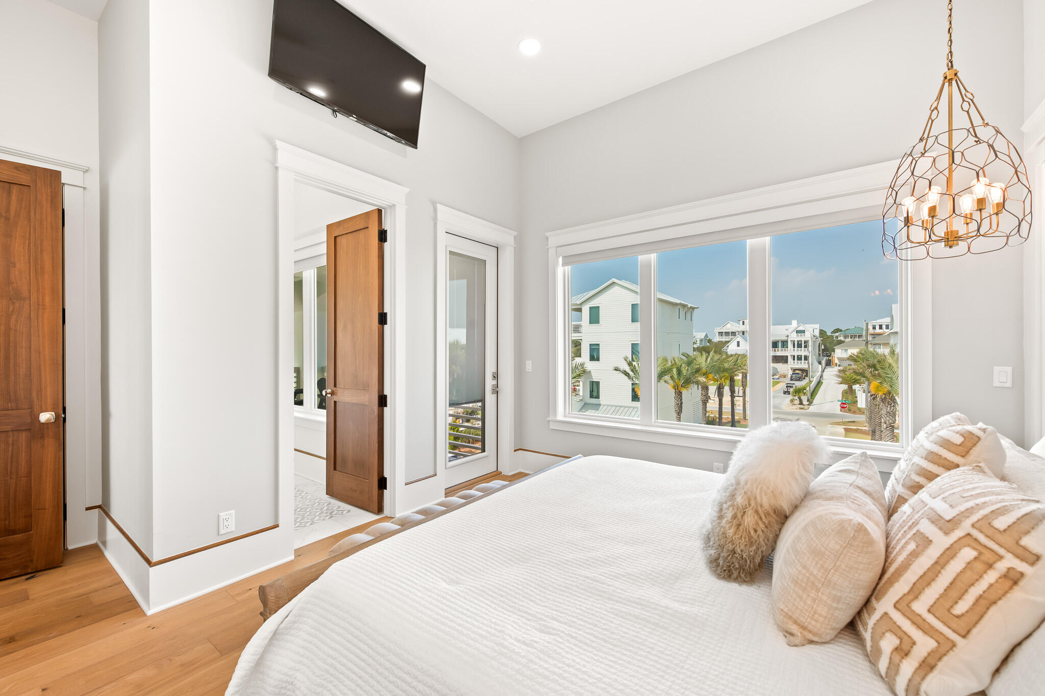 17 Palm Ct Lane Inlet Beach, FL 32461 - Photo 21 of 31 a bedroom with a large bed and a large window