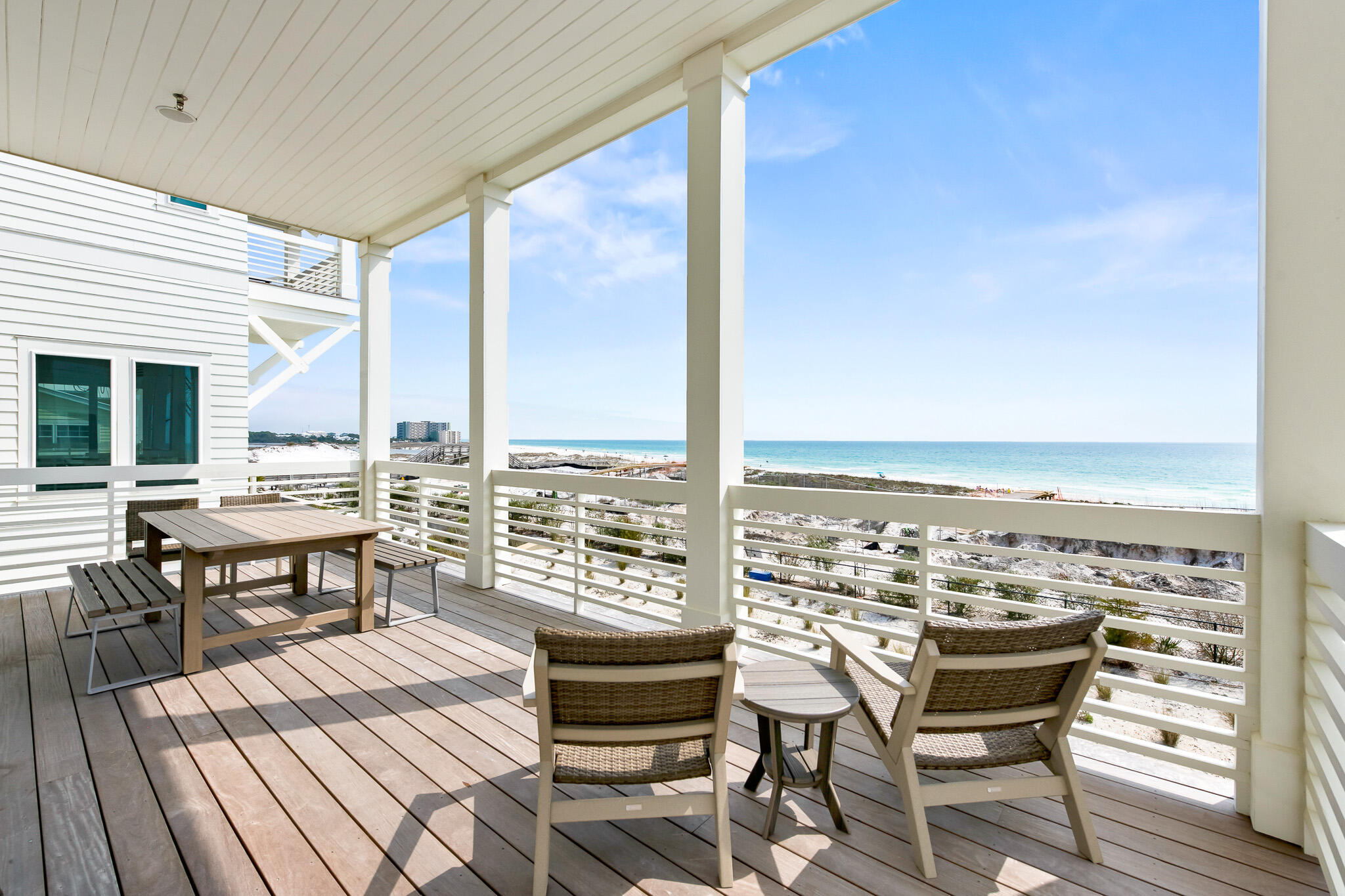 17 Palm Ct Lane Inlet Beach, FL 32461 - Photo 23 of 31 a view of a balcony with chairs