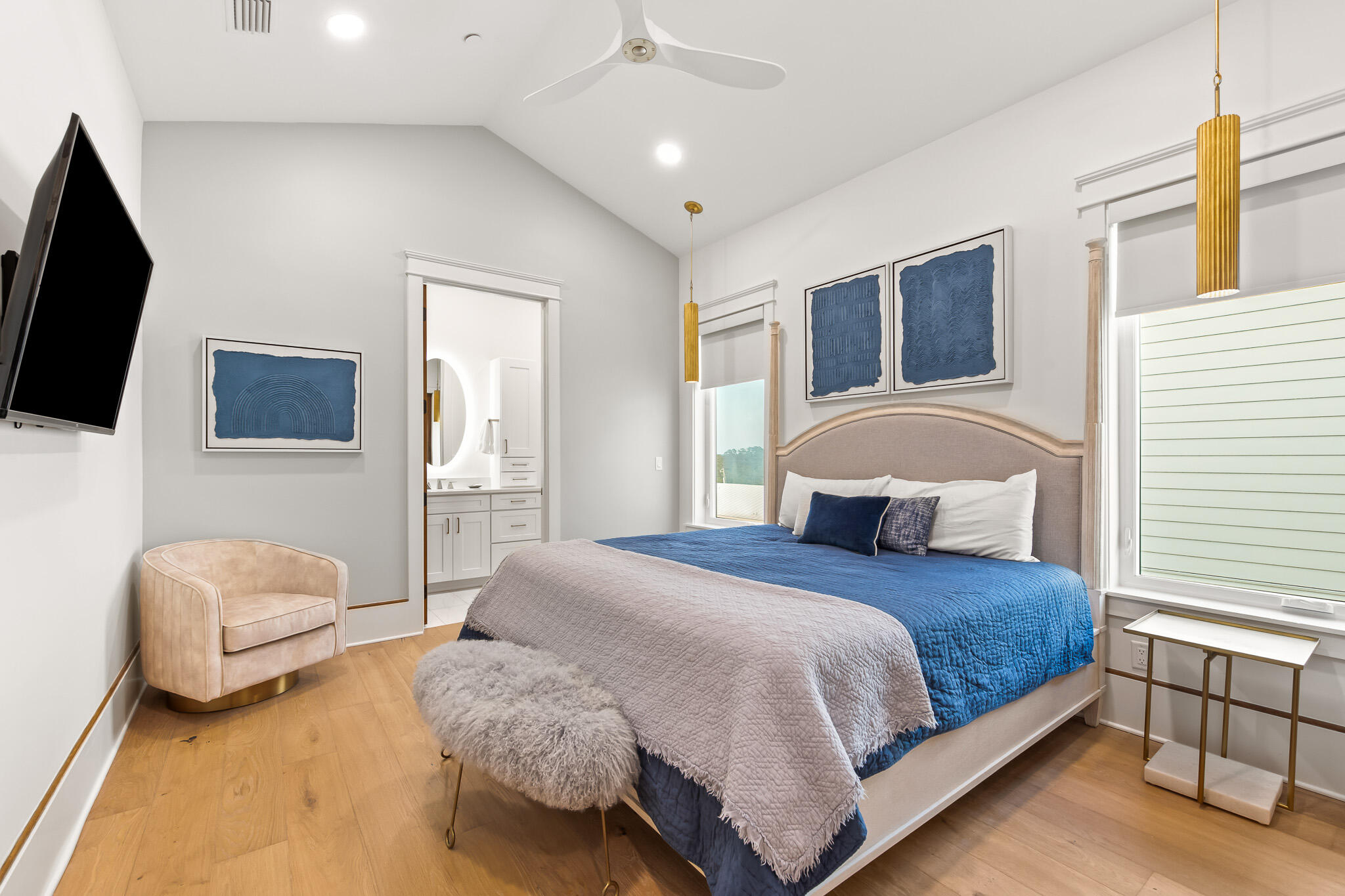 17 Palm Ct Lane Inlet Beach, FL 32461 - Photo 28 of 31 a bedroom with a bed flat screen tv and a couch