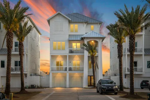 a view of living room with furniture and floor to ceiling window