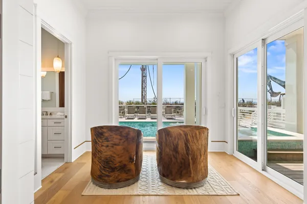 swimming pool view with balcony