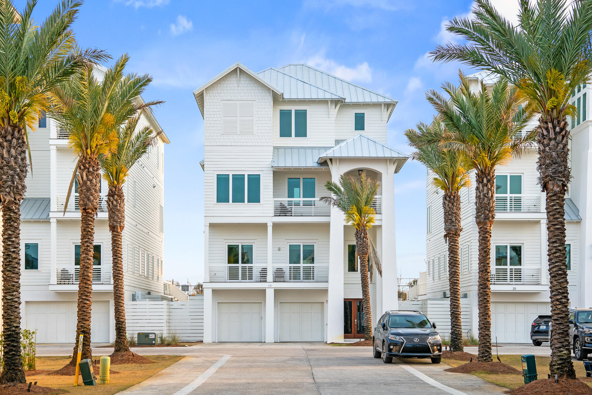 17 Palm Ct Lane Inlet Beach, FL 32461 - Photo 6 of 31 a front view of a building with a street