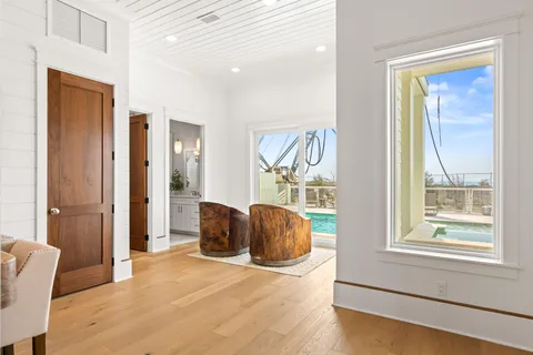 a bathroom with a granite countertop sink a toilet and shower