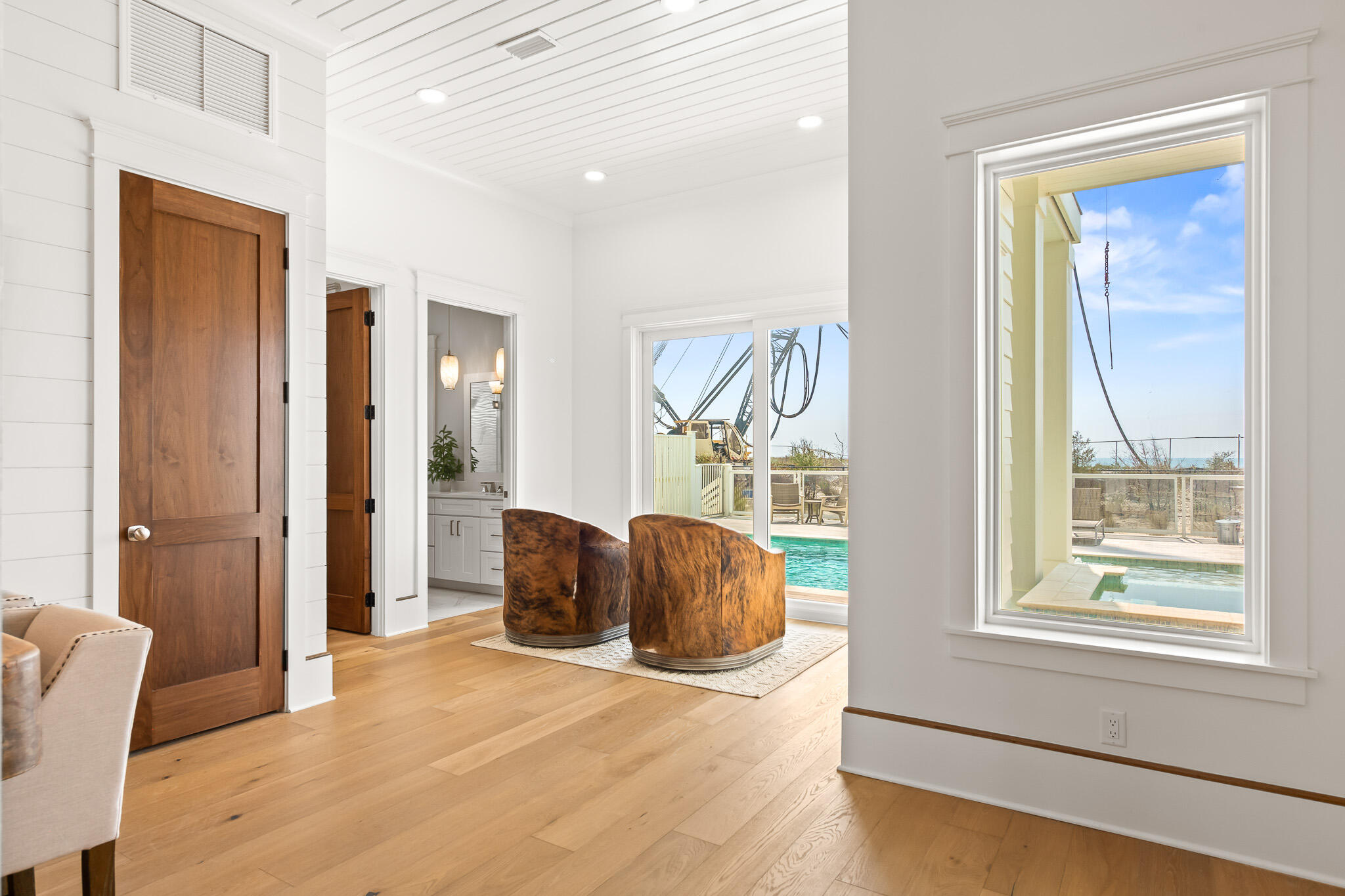 17 Palm Ct Lane Inlet Beach, FL 32461 - Photo 9 of 31 a view of a livingroom with wooden floor and a window