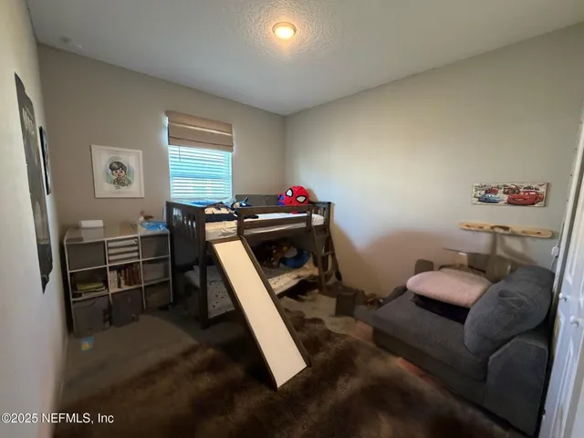 a room with furniture and a window