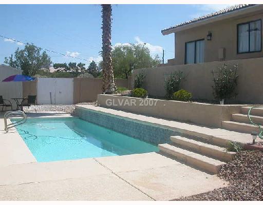 498 East Fairway Road Henderson, NV 89015 - Photo 8 of 8 Swimming Pool/Hot Tub/Sauna. Terraced patio for privacy from golf course