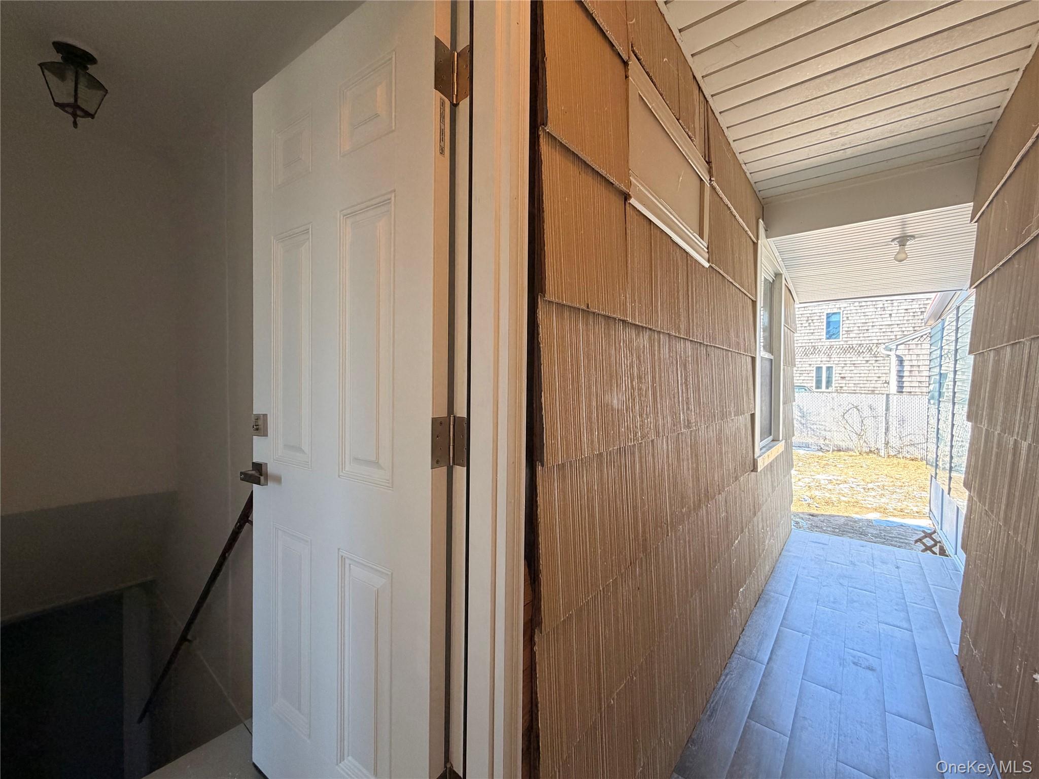 20 Bogota Road Mastic Beach, NY 11951 - Photo 17 of 34 a view of a bathroom from a hallway