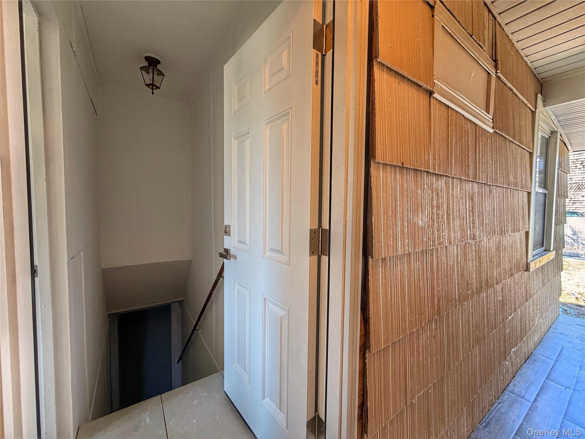 20 Bogota Road Mastic Beach, NY 11951 - Photo 18 of 34 a view of a wooden door