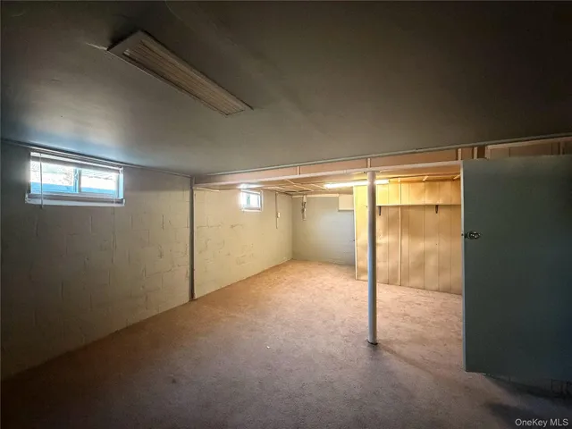 a view of storage and utility room with racks