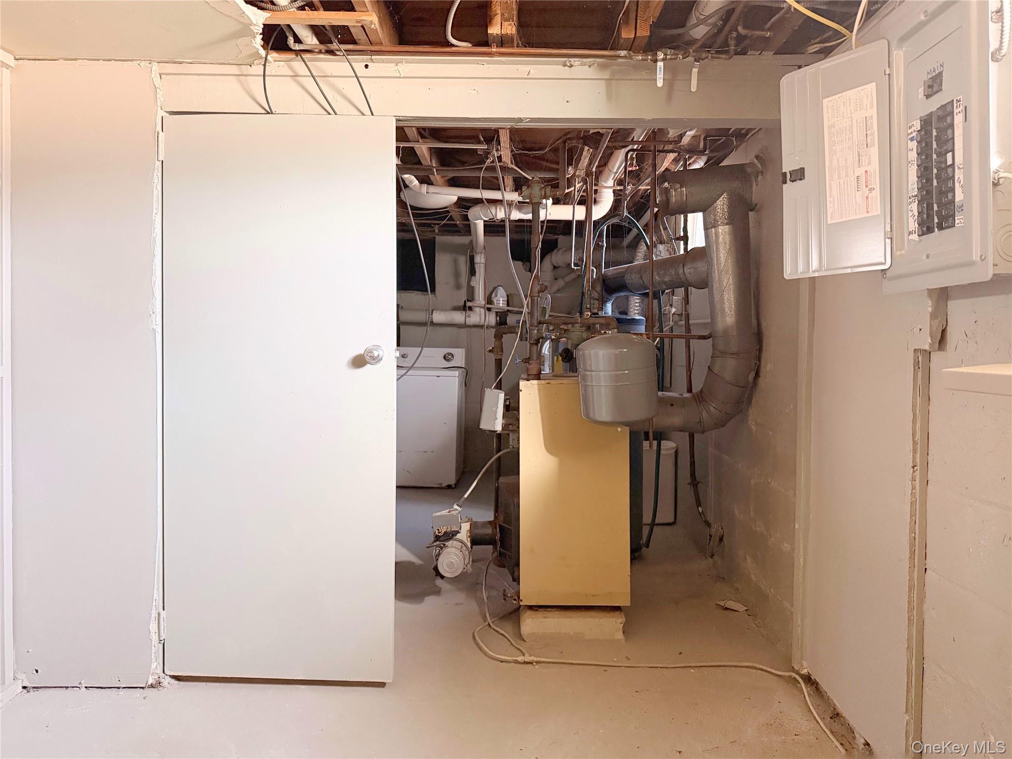 20 Bogota Road Mastic Beach, NY 11951 - Photo 23 of 34 a view of storage and utility room with racks