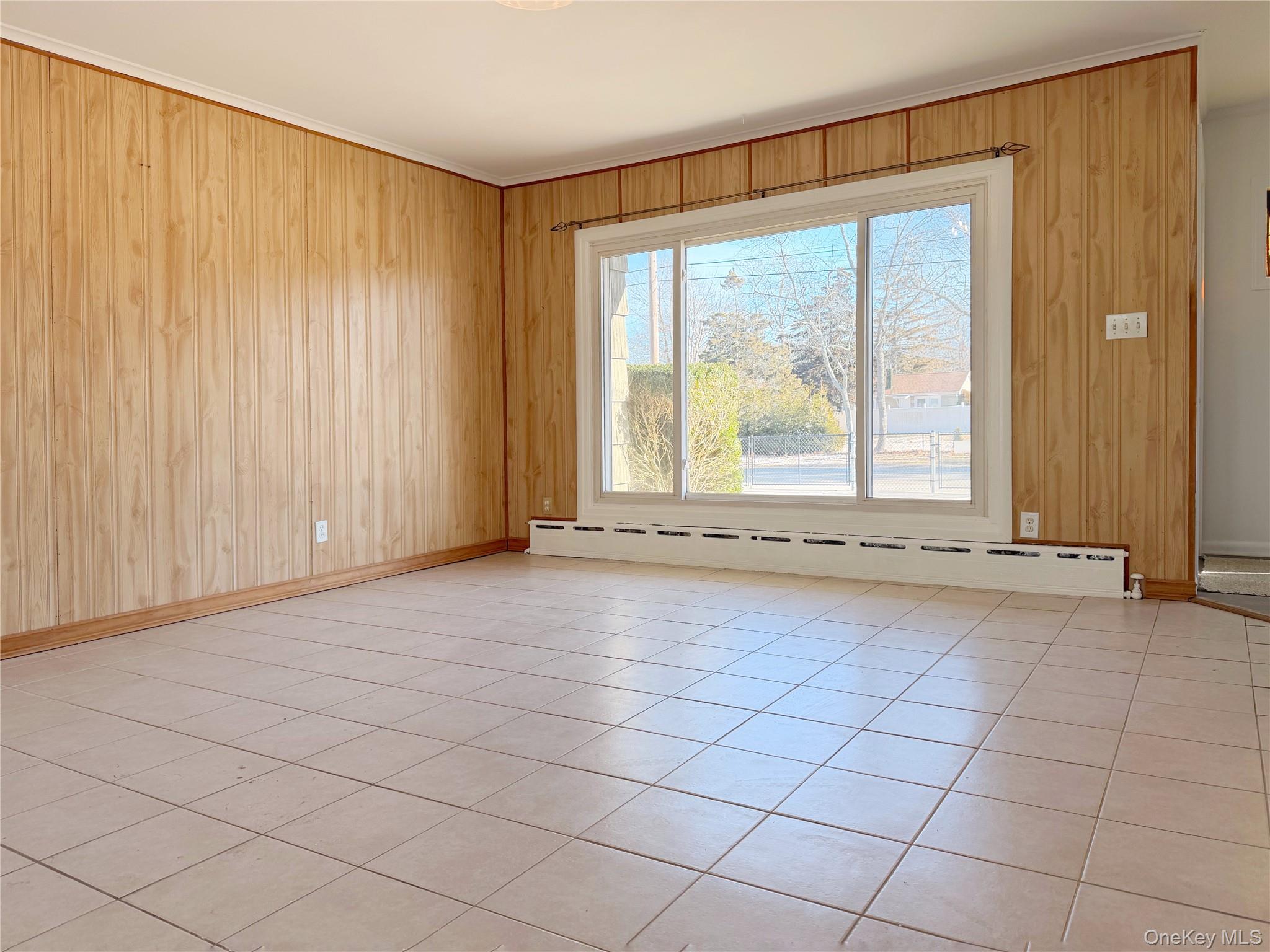 20 Bogota Road Mastic Beach, NY 11951 - Photo 27 of 34 a view of an empty room with a window