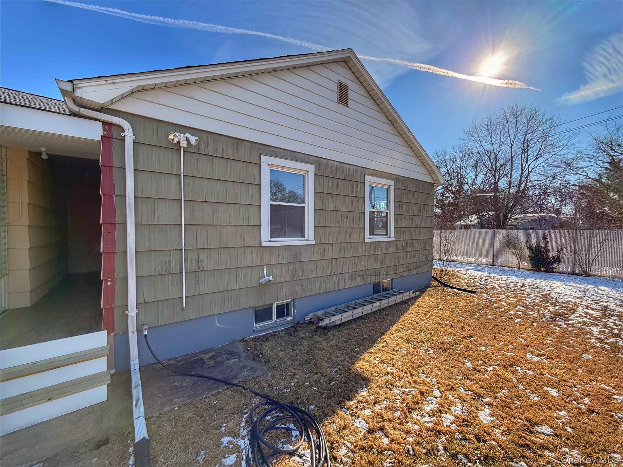 20 Bogota Road Mastic Beach, NY 11951 - Photo 29 of 34 a view of a house with a yard