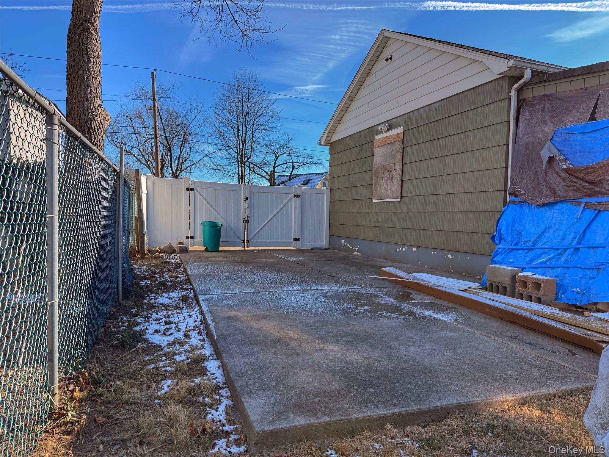 20 Bogota Road Mastic Beach, NY 11951 - Photo 31 of 34 a view of a house with a yard