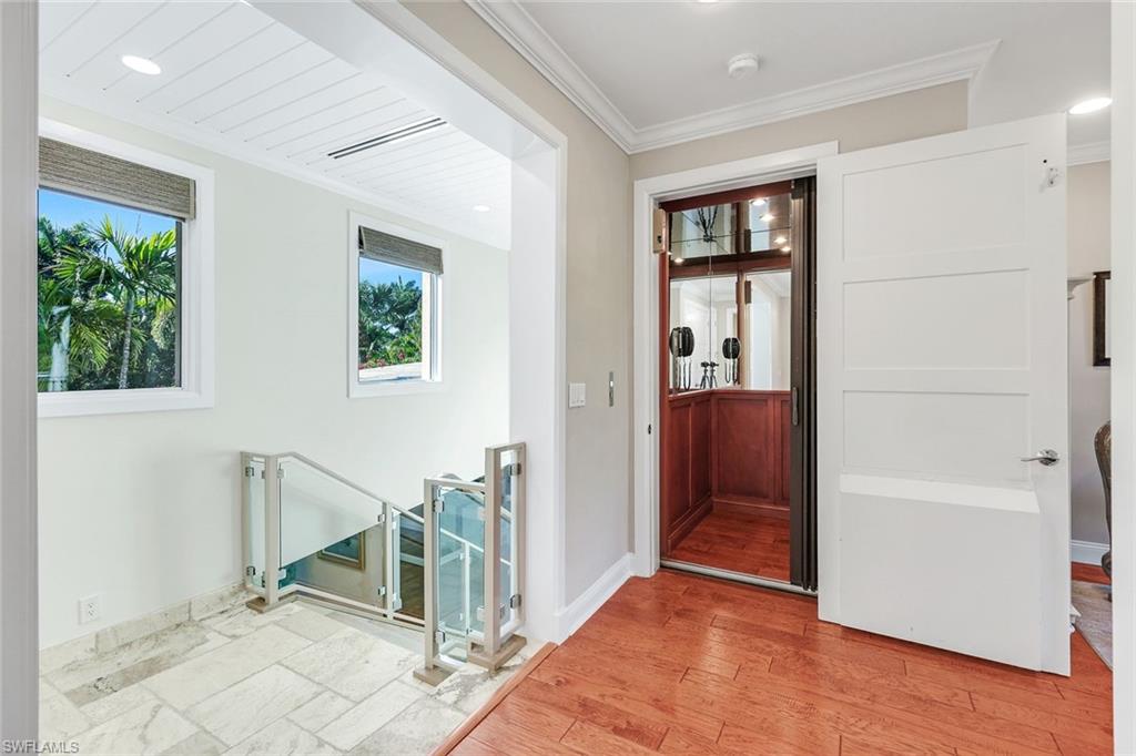 210 Central Avenue Naples, FL 34102 - Photo 32 of 50 a view of entryway with a front door
