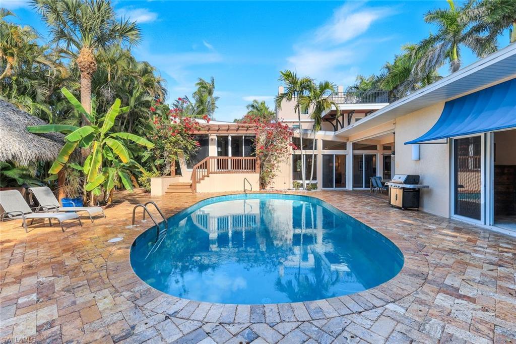 210 Central Avenue Naples, FL 34102 - Photo 44 of 50 a view of outdoor space yard deck and patio