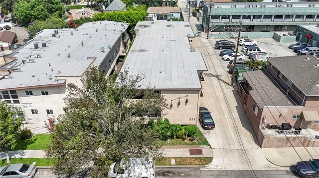 a view of building with yard and staircase