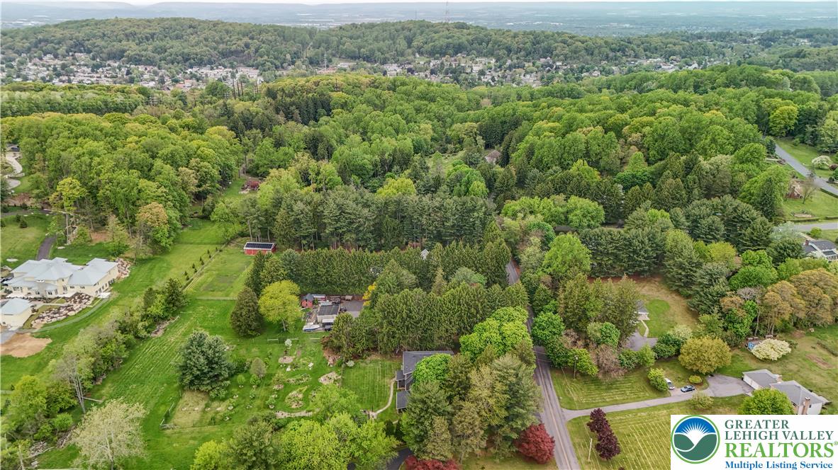 2242 Church Road Bethlehem, PA 18015 - Photo 74 of 74 an aerial view of residential houses with outdoor space and trees