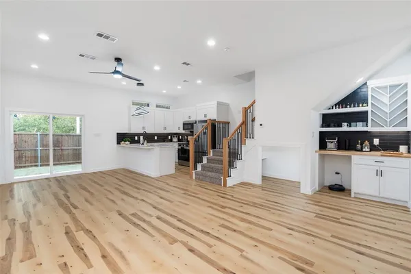 a front view of a house with a yard and porch
