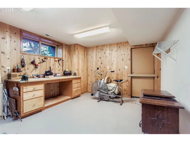 a living room with furniture a flat screen tv