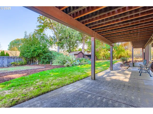 a view of a backyard with garden