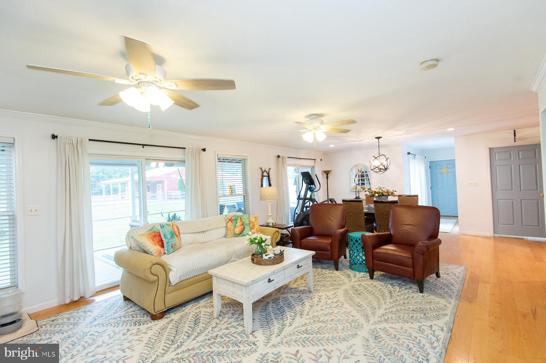 12136 Holly Road Ridgely, MD 21660 - Photo 12 of 136 a living room with furniture and a large window